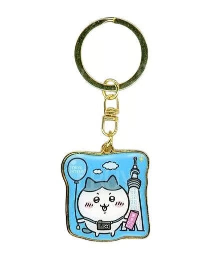 Chiikawa Tokyo Skytree Hachiware Die-Cut Acrylic Keychain - Japanese Character Merchandise featuring Hachiware in a Tokyo Skytree-themed design on a clean white background.